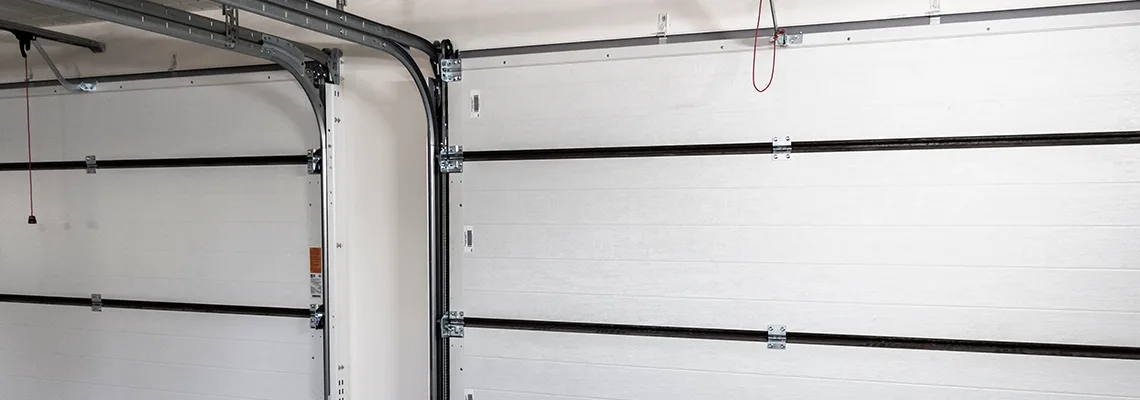 Fix Folding Garage Door Jerking in Coconut Creek, Florida