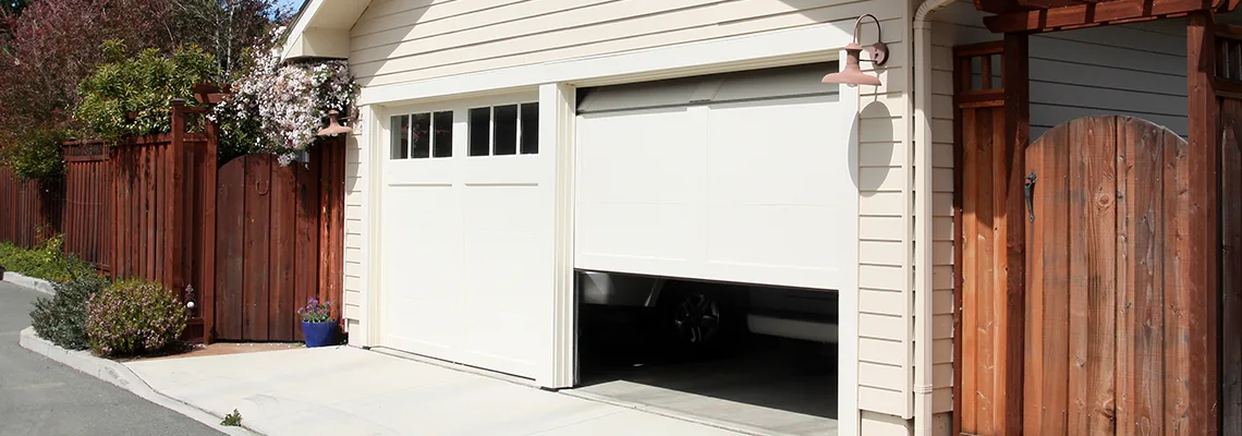 Fix Metal Garage Door Jerking in Coconut Creek, Florida